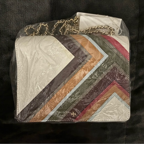 Tory Burch “Robinson” convertible multi-stripe leather shoulder bag.